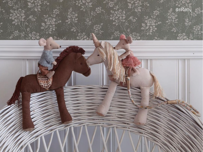 Pony and unicorn playing