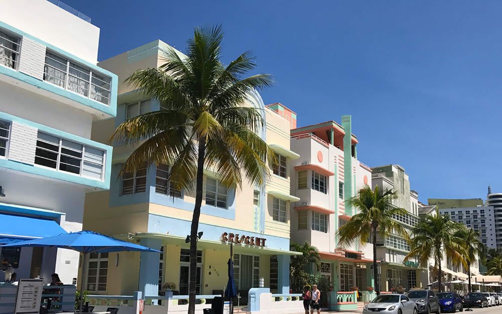 The exterior of several Art Deco-style hotels in Miami Beach