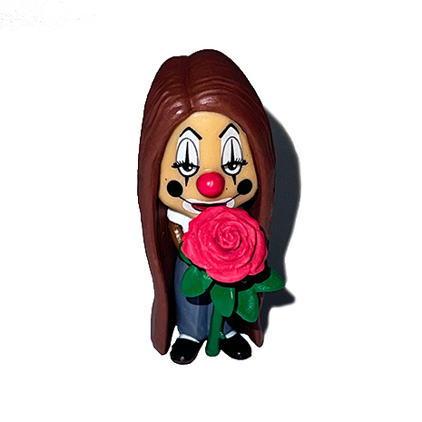 Use your points to win a feminine clown figure, holding a rose from DGA