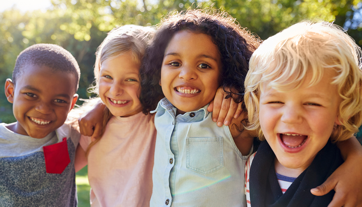 Kids smiling and laughing.