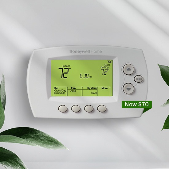 7-Day WiFi Programmable Thermostat with leaves on each side on a light gray background