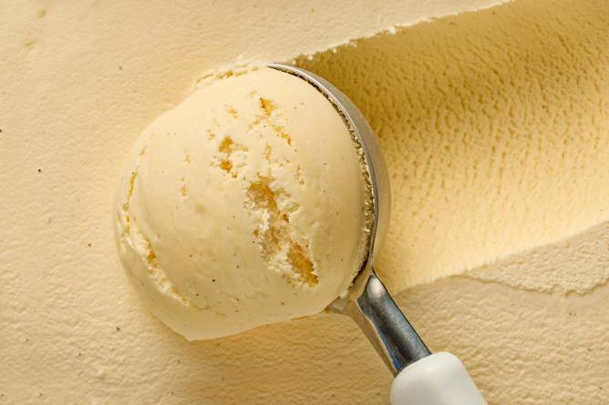 Vanilla ice cream being scooped