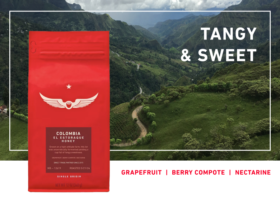 Red coffee bag in front of a beautiful landscape in the twon of Buesaco, Narino in Colombia