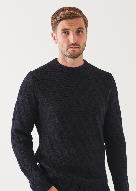 MERINO CABLE KNIT SWEATER