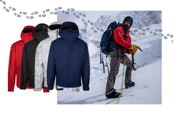 Image of a man wearing the Anchor Belay jacket in Red while climbing up a mountain wearing full climbing gear. Holding an ice axe and a glacier is behind him. Hiking boot footprints go from left to right in the upper section.