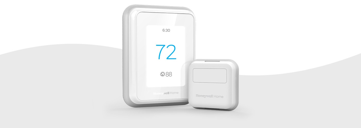 Gray Wave Background with the T9 Smart Thermostat and Room Sensor in front