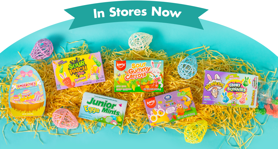 Easter boxed candy on yellow basket grass with egg decorations