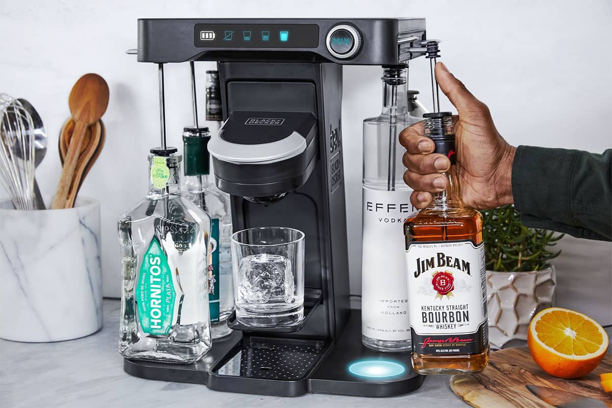 bev cocktail machine being used with liquor