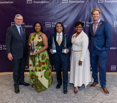 Truist Foundation announces top grant recipients at its second Inspire Awards, held at the Knight Theater in Charlotte, N.C., on Wednesday, April 24, 2024. L-R: Truist Financial Chairman and CEO Bill Rogers, Immigrants Rising National Entrepreneurship Manager Denea Joseph (second place), Centro Community Partners Founder and CEO Arturo Noriega (first place and audience favorite), Truist Foundation President Lynette Bell, and Sportscaster and Former NFL Player Greg Olsen, who served as host.