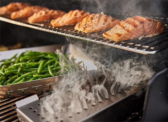 image of Get wood-smoked flavor from your gas grill with the stainless-steel smoker box.