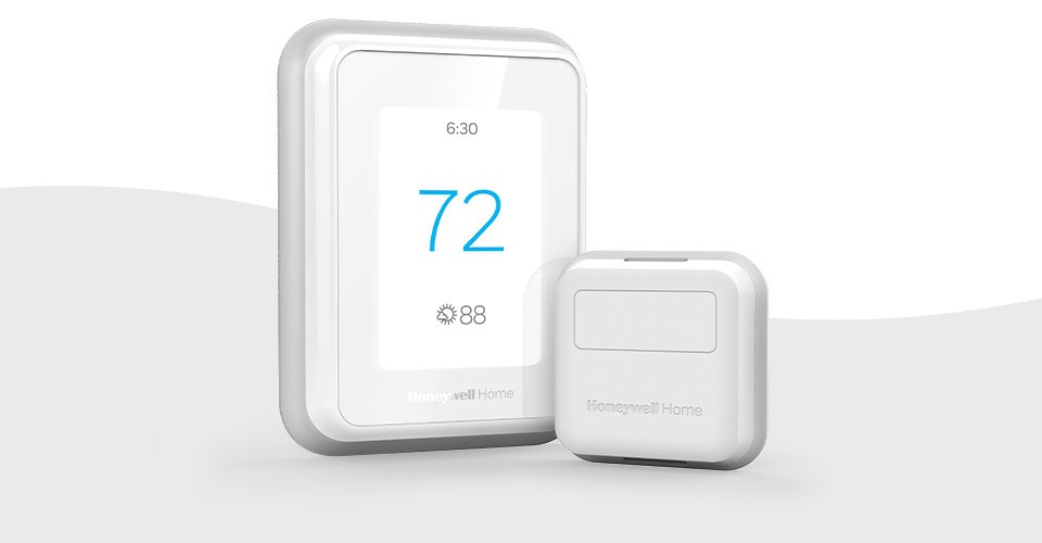 Gray Wave Background with the T9 Smart Thermostat and Room Sensor in front