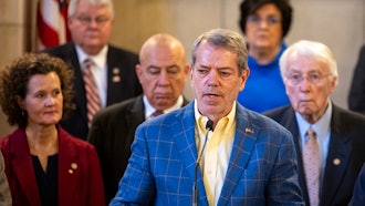 Nebraska Gov. Jim Pillen and state senators at a press conference in the Warner Chamber at the Capitol, Feb. 12, 2024.