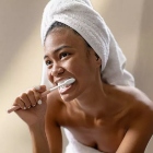 Woman brushing teeth image