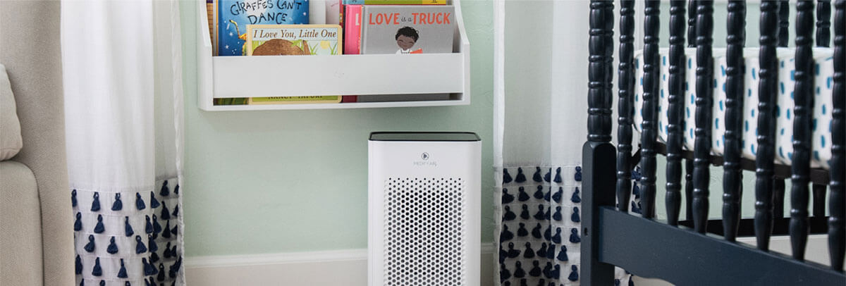 MA-25 air purifier in a baby's room