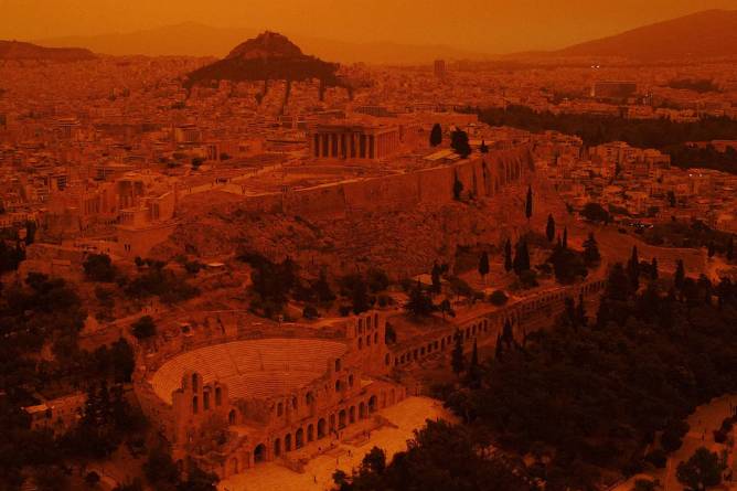 The Acropolis in Athens covered in a dust cloud