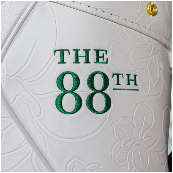 Zoomed in image of the side of the season opener staff bag, showing 'The 88th' in green stitching