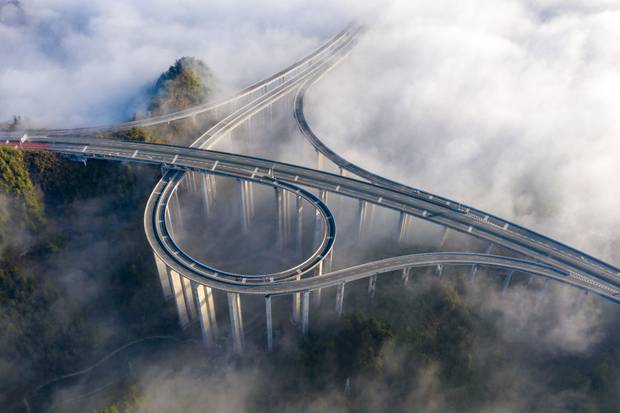 Sea of cloud scenery appears over Shijiazhai Interchange Bridge on March 29, 2024